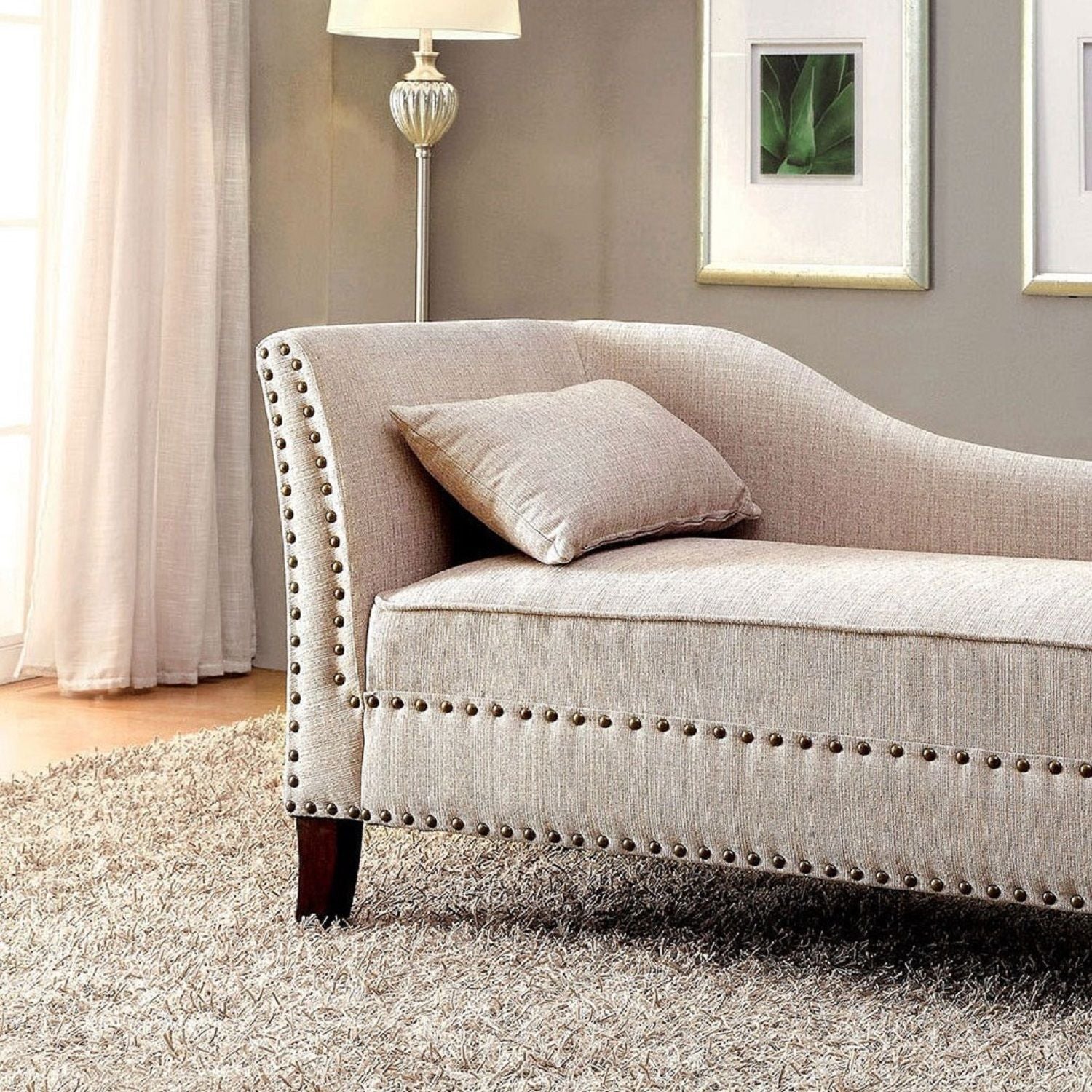Chaise With Nailhead Trim And Plush Pillow
